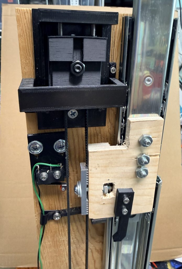 Idler adjuster, with the carriage and belt attachment